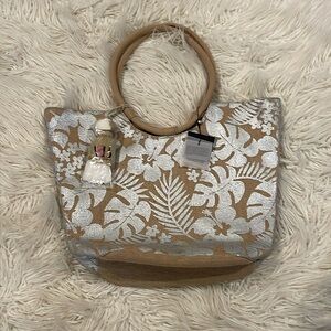 America and beyond jute tote With silver leaves and flowers